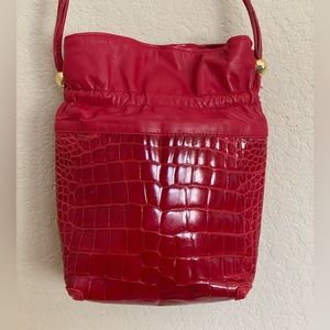 Vintage Gucci alligator drawstring bucket bag in red